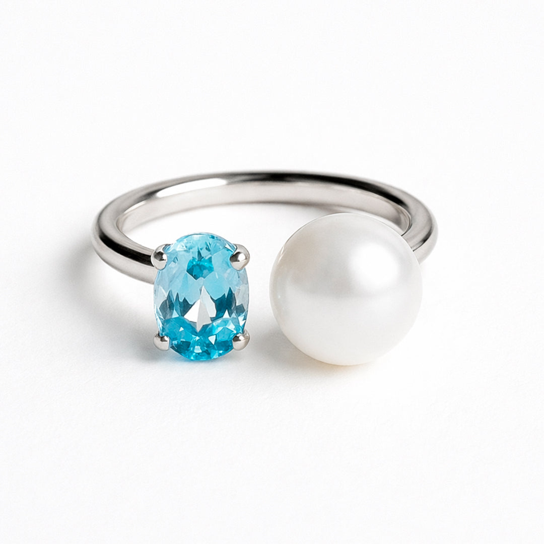 Anillo De Plata .925 Abierto Tú y Yo Con Topacio Azul Y Perla