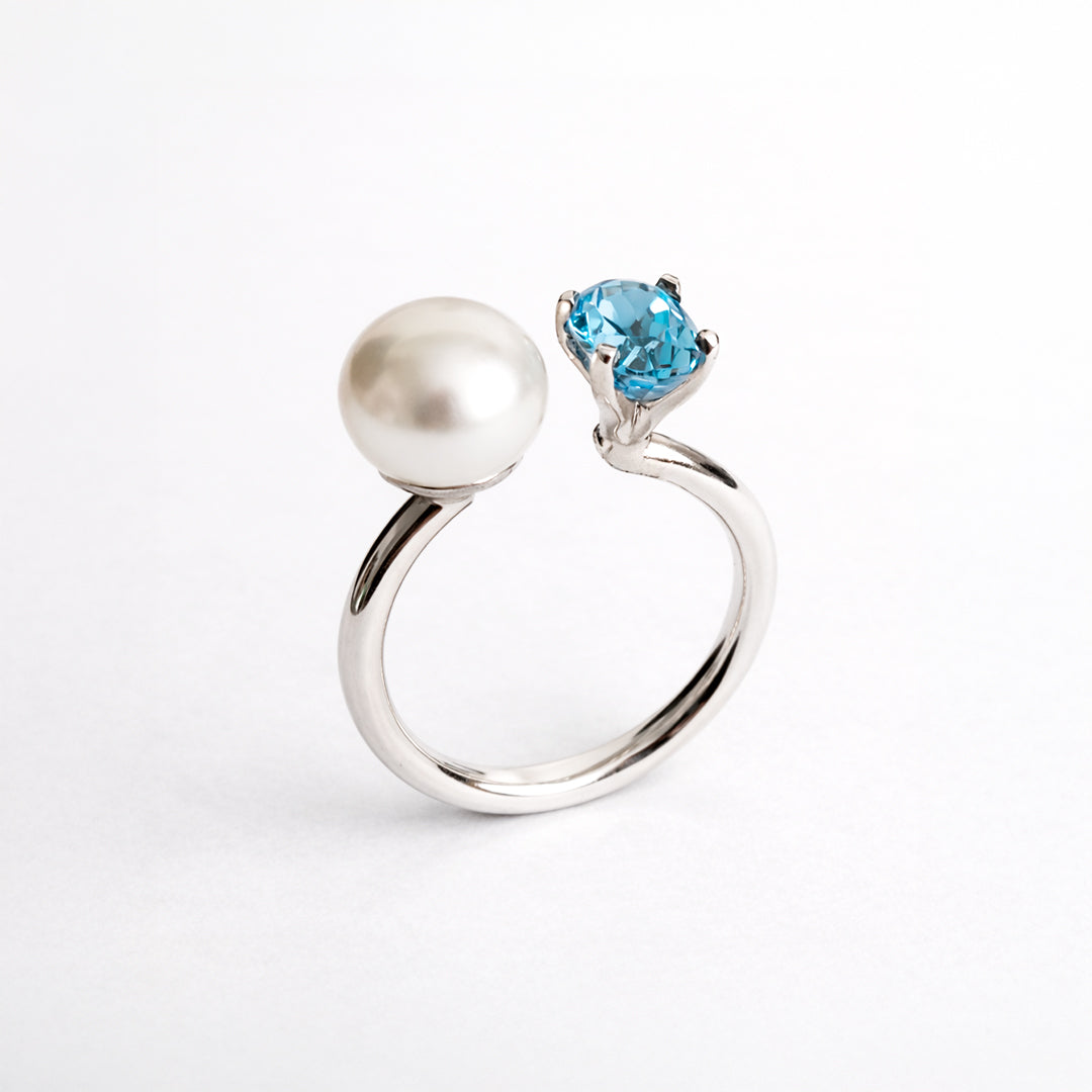 Anillo De Plata .925 Abierto Tú y Yo Con Topacio Azul Y Perla