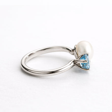 Anillo De Plata .925 Abierto Tú y Yo Con Topacio Azul Y Perla
