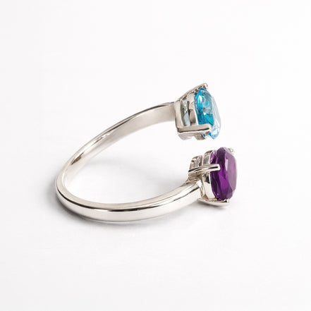 Anillo De Plata .925 Cruzado Con Topacio Azul Y Amatista